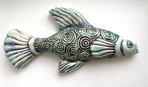 Wall Fish: Guy "Guppy" Couple with Raindrops on Water