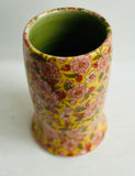 Porcelain Pottery Vase with Pink flowers on a Yellow Ground